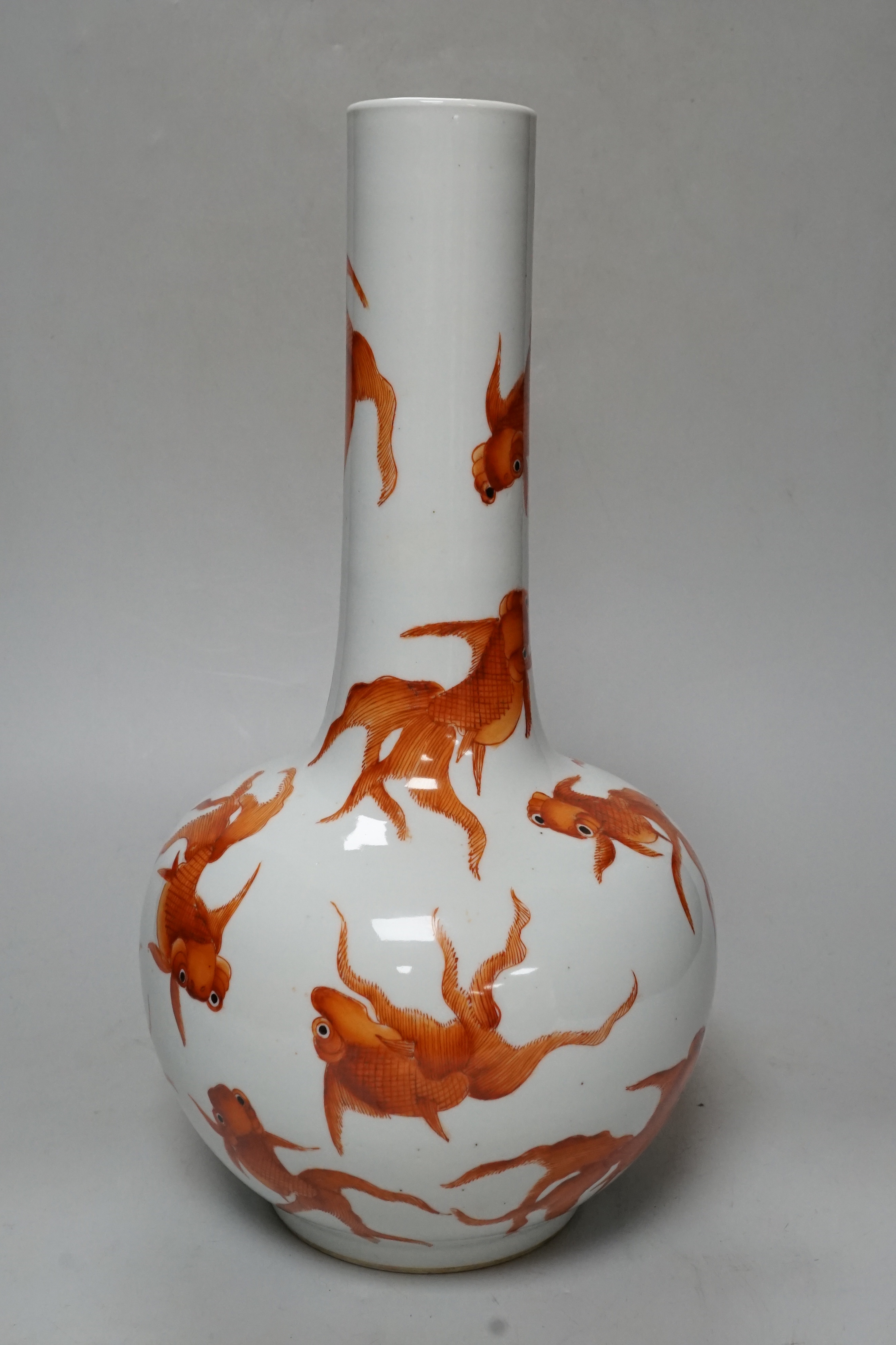 A Chinese iron red enamelled ‘goldfish’ bottle vase, 36cm tall